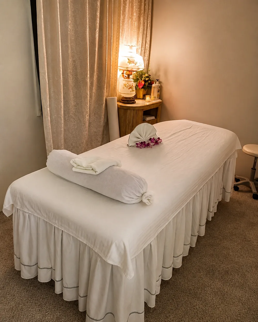 Private massage treatment room with fresh linens and warm lamplight at Balancy Spa 9 in Mahopac, NY
