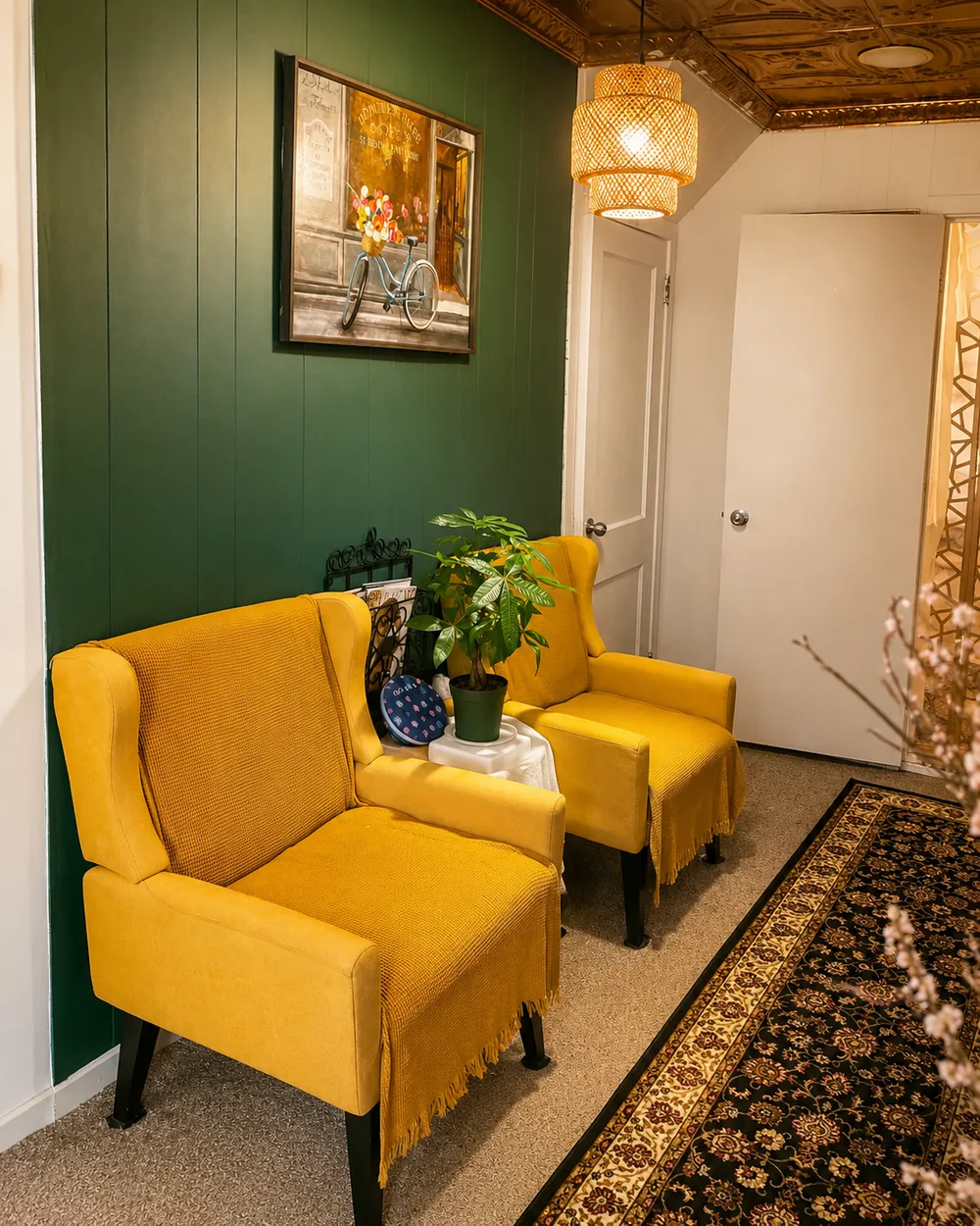 Waiting area with velvet armchairs and a pressed-tin ceiling at Balancy Spa 9 in Mahopac, NY